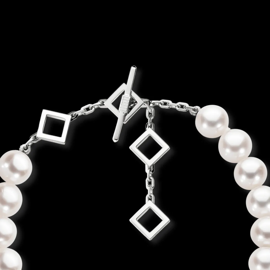 white_round_pearl_bracele_2.webp Outlet MJ Jones White Round Pearl Bracelet